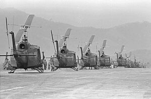 Helicopters of the 170th and the 189th Helicopter Assault Companies, await the leading of troops at Polei Kleng, in the Central Highlands of the Republic of South Vietnam., 04/10/1969