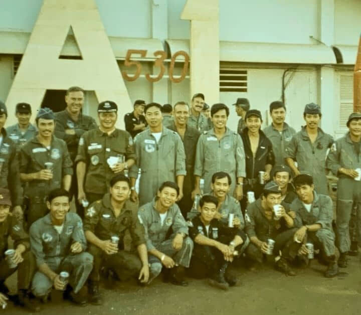 Lt. Col. John C. Carmichael with Republic of Vietnam Air Force pilots in Vietnam in 1971