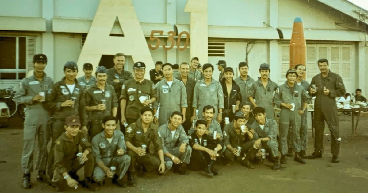 Lt. Col. John C. Carmichael with Republic of Vietnam Air Force pilots in Vietnam in 1971
