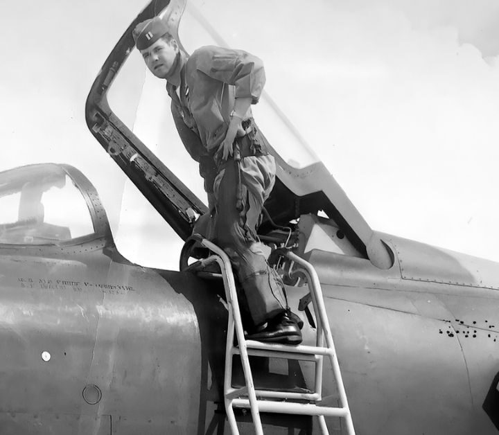 Captain Joseph Ralston climbs into an F-105 Thunderchief at Takhli Royal Thai Air Force Base during the Vietnam War.