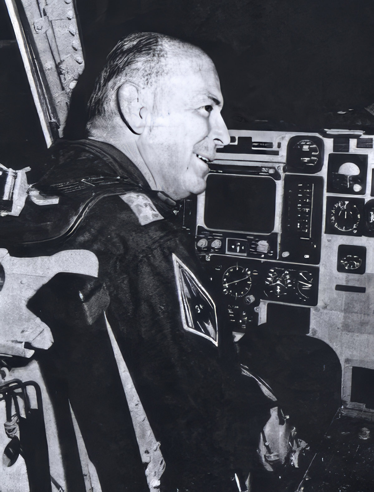 Gen. Russell E. Dougherty seated in an aircraft cockpit